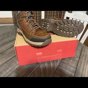Mens size 8 1/2 brand new  aluminum toe redwing boots.